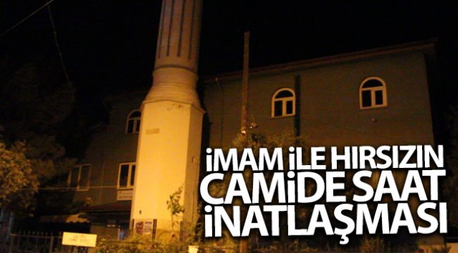 İmamla inatlaşan hırsız kafaya koyduğu saati çaldı