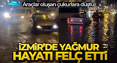 İzmir’de yağmur hayatı felç etti: Araçlar oluşan çukurlara düştü