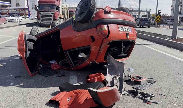 Takla atan otomobilden burnu bile kanamadan kurtuldu