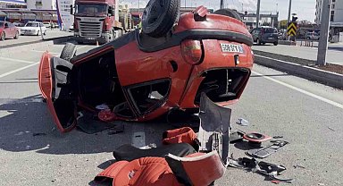 Takla atan otomobilden burnu bile kanamadan kurtuldu