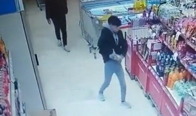 Tereyağı ve saç düzleştirici çalan hırsızlar güvenlik kamerasında