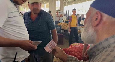 Sahte 10 bin TL ile alışveriş için çıktığı pazarda esnafa yakalandı