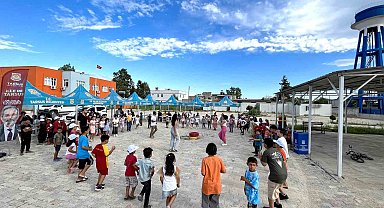 Tarsus'ta 11 köyde bin 500 çocuğa ulaşıldı