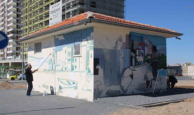 Ressam baba ve kızı duvarları tabloya dönüştürüyor