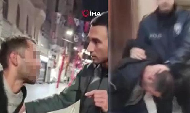 Türk bayraklarına çirkin saldırı! Devlet büyüklerine hakaret etti, yanına gelen kişi de onu savundu