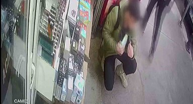 Dakikalarca önünde beklediği tezgahtan çakmak dolu kutuyu böyle çaldı