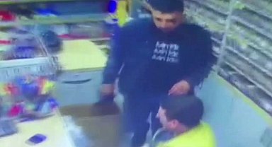 Gaziosmanpaşa'da dehşet anları kamerada: Silahlı soyguncu kasadaki 22 bin lirayı ve çalışanın üzerindeki bin lirayı gasp etti