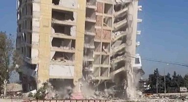 Halatla çekilen 8 katlı bina yerle bir oldu