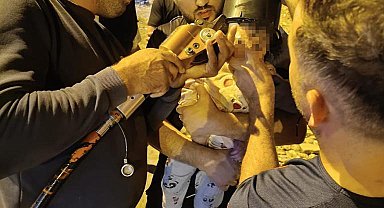 Kafasını kovaya sıkıştıran çocuğun yardımına itfaiye yetişti