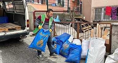 Kütahya İHH'dan ihtiyaç sahibi 300 aileye soba, kömür ve erzak yardımı