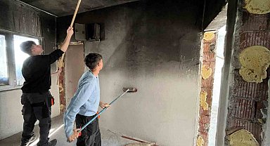 Yanan evi yabancı öğrencilerle tamir ettiler