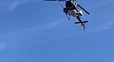 Yüksek gerilim hatları helikopterle temizlendi