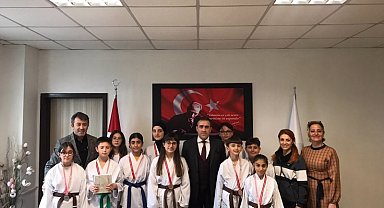Kaymakam Memiş, şampiyon sporcuları kabul etti