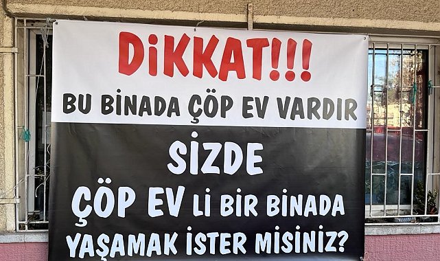 Mahalleliden çöp eve pankartlı tepki