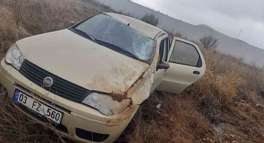 Takla atan otomobilde 2 kişi yaralandı