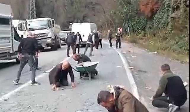 Yola dökülen çivileri elleriyle topladılar