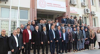 Alkışlarla görevine geri döndü