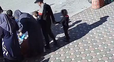 Dikkat çekmemek için çocuğuyla hırsızlığa çıktı, güvenlik kameralarına takıldı