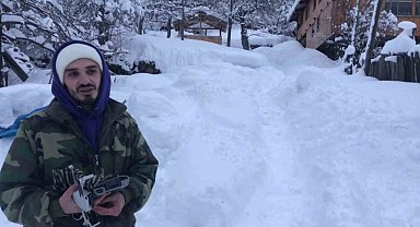 Kar nedeniyle yollar kapanınca market alışverişlerini dronla yaptı