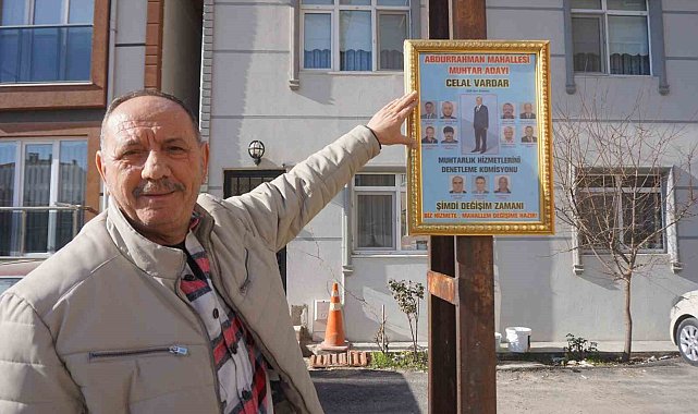 Muhtar adayı, altın yaldızlı çerçeveyle destek istiyor