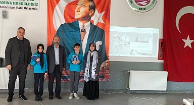 Okul birincilerine Kur'an-ı Kerim hediye edildi