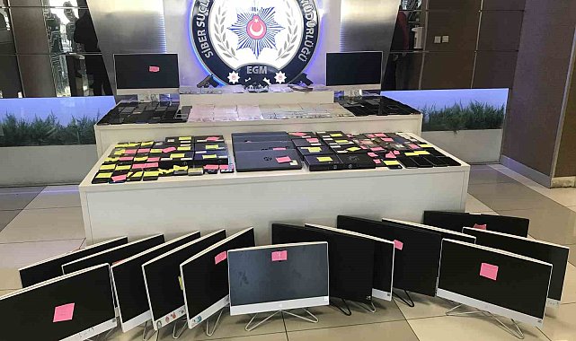 Uluslararası dolandırıcılık şebekesinden ele geçirilen malzemeler emniyette sergilendi