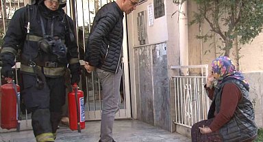 Aspiratörden çıkan yangında anne ve oğlu dumandan etkilendi, komşusu ise yangını canlı yayınla aktardı