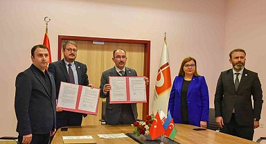 BŞEÜ ile Azerbaycan arasında yeni bir iş birliğine imzalar atıldı