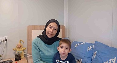 Enkazdan kurtarılan 2 yaşındaki Göktuğ ve annesi o günü unutamıyor