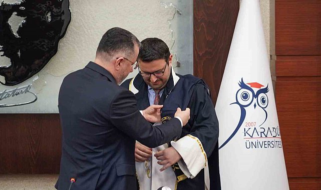 Görevde yükselen akademisyenlere belgeleri takdim edildi
