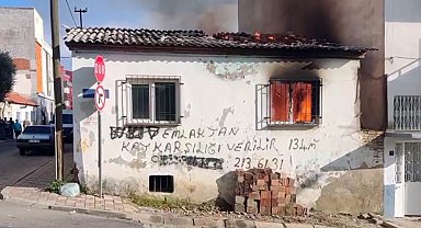 Metruk binada çıkan yangın mahalleyi sokağa döktü