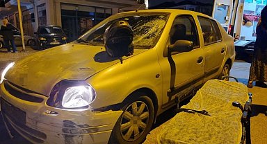 Otomobilin camına çarparak savrulan motosiklet sürücüsü yaralandı