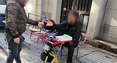 Polis kılık değiştirdi, telefon hırsızını suçüstü yakaladı