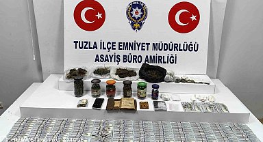 Tuzla'da yakalanan zehir tacirinin evinden farklı ülkelere ait nakit para çıktı