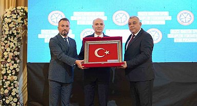 Başkan Özlü'ye spor camiasından plaket
