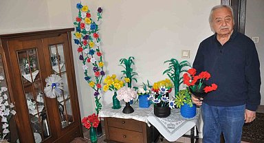 Geri dönüşüm malzemeleriyle evini adeta çiçek bahçesine çevirdi
