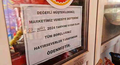 Hayırsever, bakkalın veresiye defterindeki borçları ödedi