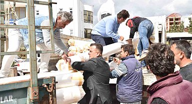 Hortumdan zarar gören Demreli üreticilere naylon desteği