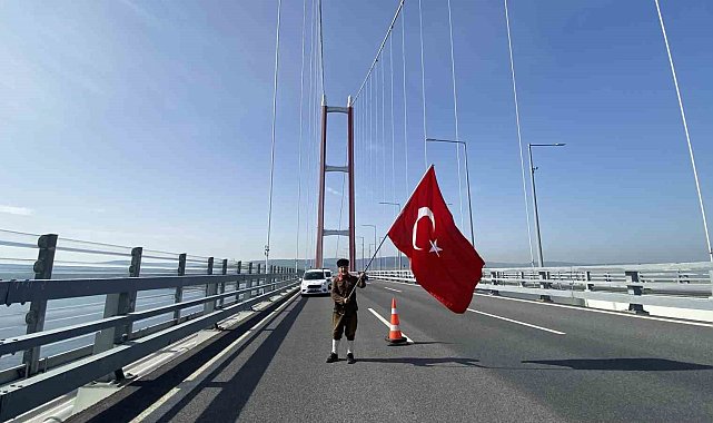 Şehitler için Çanakkale'ye yürüyen gazi torunu, Türk bayrağıyla 1915 Çanakkale Köprüsü'nü yürüyerek geçti