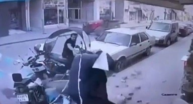 Binadan düşen çanak antenin altında kalmaktan kıl payı kurtuldu