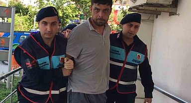 Bir aileyi öldürüp yaktığı iddia edilen şüpheli tutuklandı