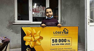 Minik Ahmet'e 50 bin TL ihtiyaç çeki