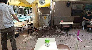 Samsun'da 5. kattan çay ocağı önüne düşen saksı az kalsın faciaya neden oluyordu