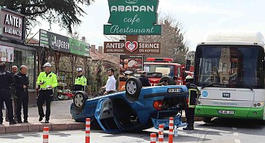 Ters dönen otomobilden burunları bile kanamadan çıktılar