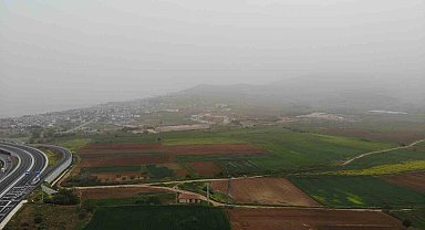Ülkenin batısını saran çöl tozu havadan görüntülendi