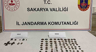 Üstünde 91 tarihi sikke ve objeyle yakalandı