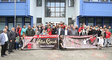 Milli güreşçilere coşkulu karşılama