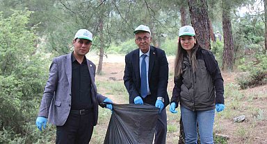 Ormanlık alandan poşet poşet çöp çıktı