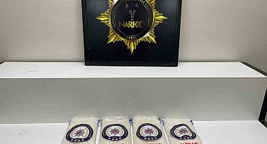 Polis operasyonunda kumaşların içine gizlenmiş 4 kilo 36 gram uyuşturucu madde ele geçirildi