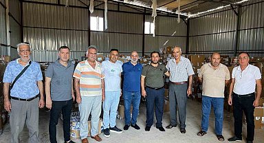 Antalya'da ihtiyaç sahibi ailelere 100 bin parça giysi dağıtıldı